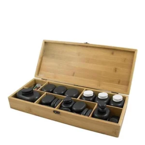 Coffret de pierres de massage.